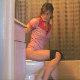 A hidden camera records an attractive girl shitting and pissing while sitting on a toilet in at least 5 scenes. Audible pooping. 218MB, MP4 file. About 8.5 minutes.